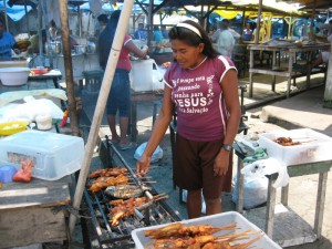 Kristina selling her grilled chicken