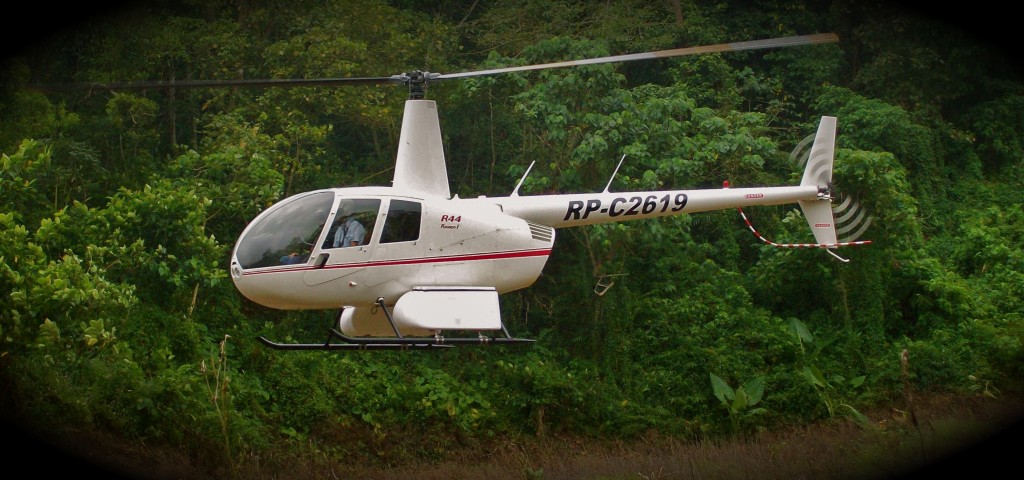 Here's the helicopter on one of it's first operational flights into the jungle. It's number is "2-6-1-niner." "6-1-niner" was the Supercub that used to fly for my parents on Palawan and many, many other missionaries here. 