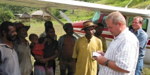 Lyle Mankey and John Meerstra talking with the Dinangat people at the airstrip.