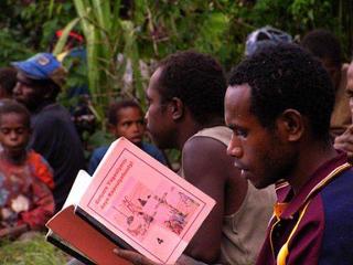 Josak reading the scripture. Josak reading the scripture.