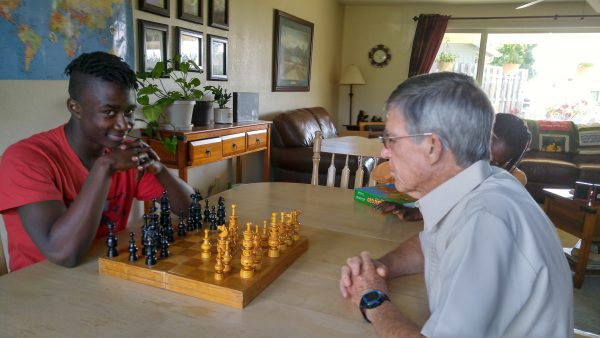 Caleb, our grandson, and Darryl play chess together.