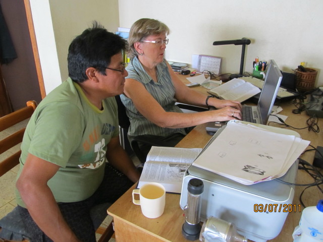 Carol and Herman working on Bible lessons
