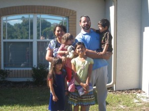 Hess family infront of house in Florida