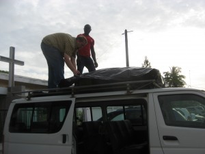 Loading the van.  Jacob's packing skills put to use again. 