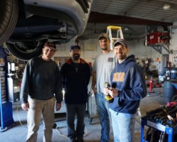 Teammates in the garage.