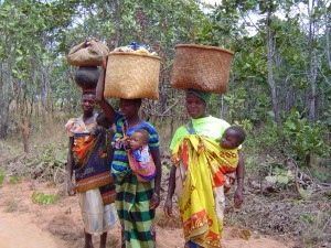 Ladies with Babies Carrying Baskets on Heads