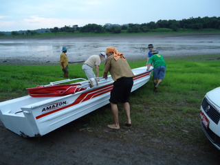 Trying to get the boat to the water.