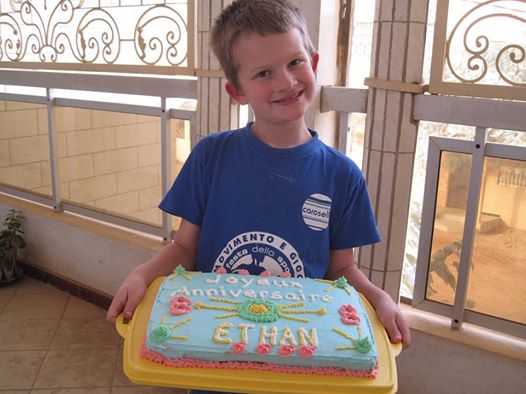 Ethan with the amazing Birthday cake that his Grandma made for him 