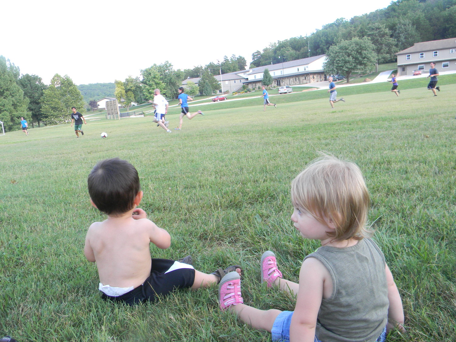 Judah and his friend Selah watching the soccer game