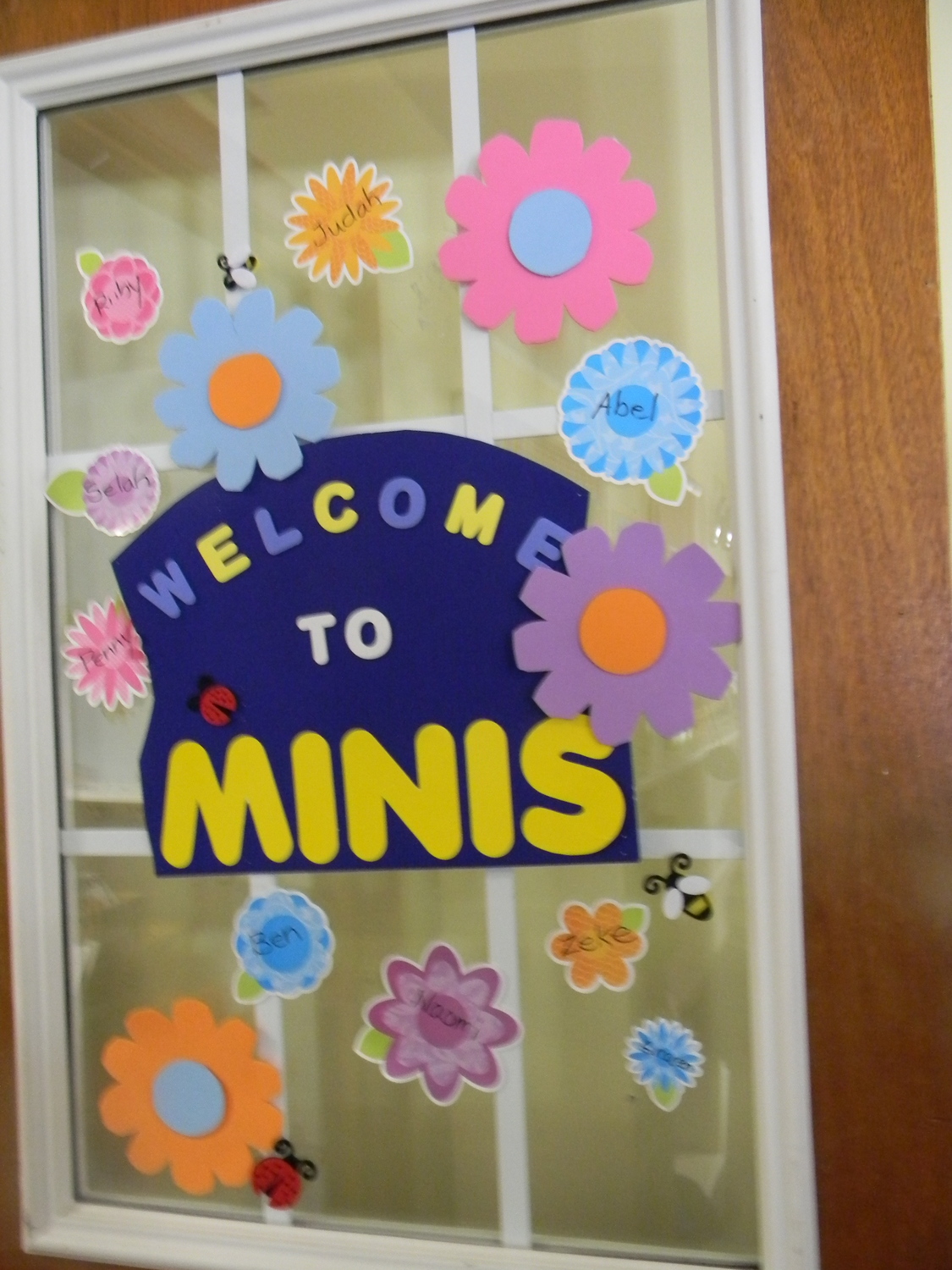 The door to Judah's nursery room -- he's in "Minis" with the other 1 year old kids