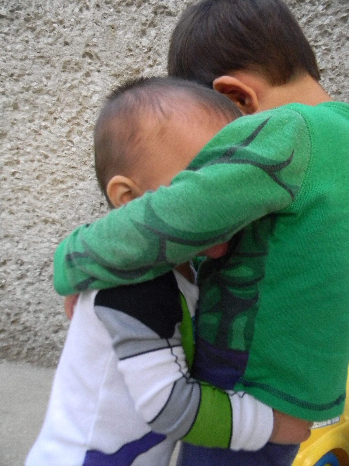 Real superheroes hug their brother