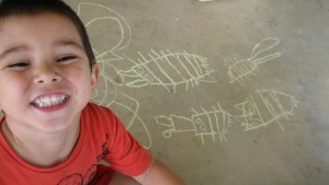 Judah with his chalk "dawcrads" (crawdads) drawing
