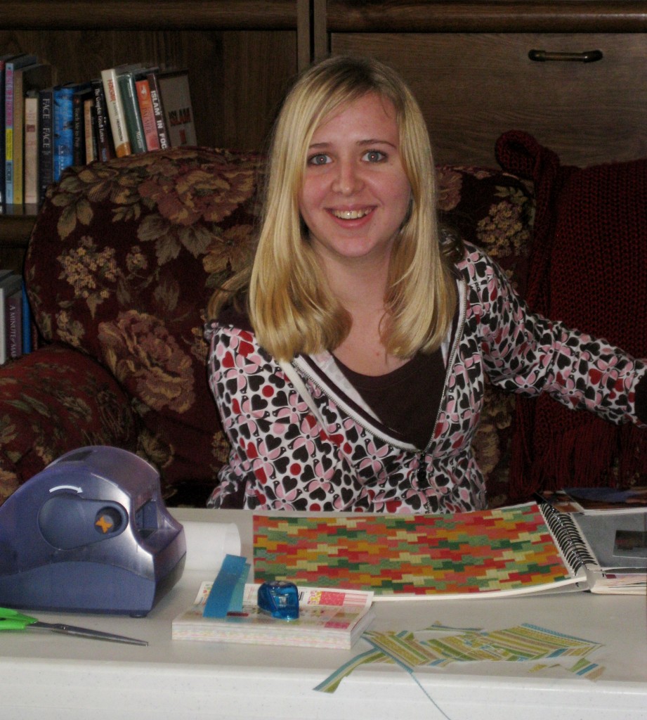 Victoria working on a scrap book