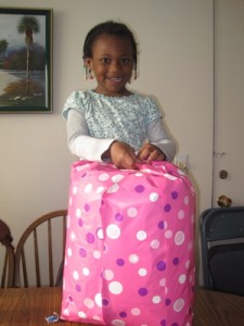 Jada opening one of her gifts