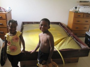 James and Jada Supervising the Filling of the Waterbed
