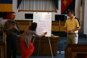 Rob Greenslade preaching at Newport Southern Baptist Church on June 2, 2013. Jordan and Amy Husband are assisting with the A.C.C.E.S.S. illustration.