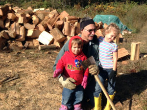 Titus, Rob, and Elayne out with the woodpile