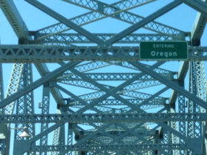The 'entering Oregon' sign on a bridge near Longview, WA