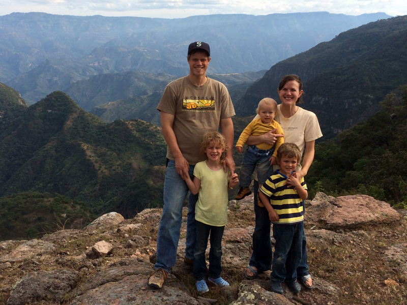 Jordan, Elayne, Joel, Titus and Amy in front of a large canyon around the village of Las Moras