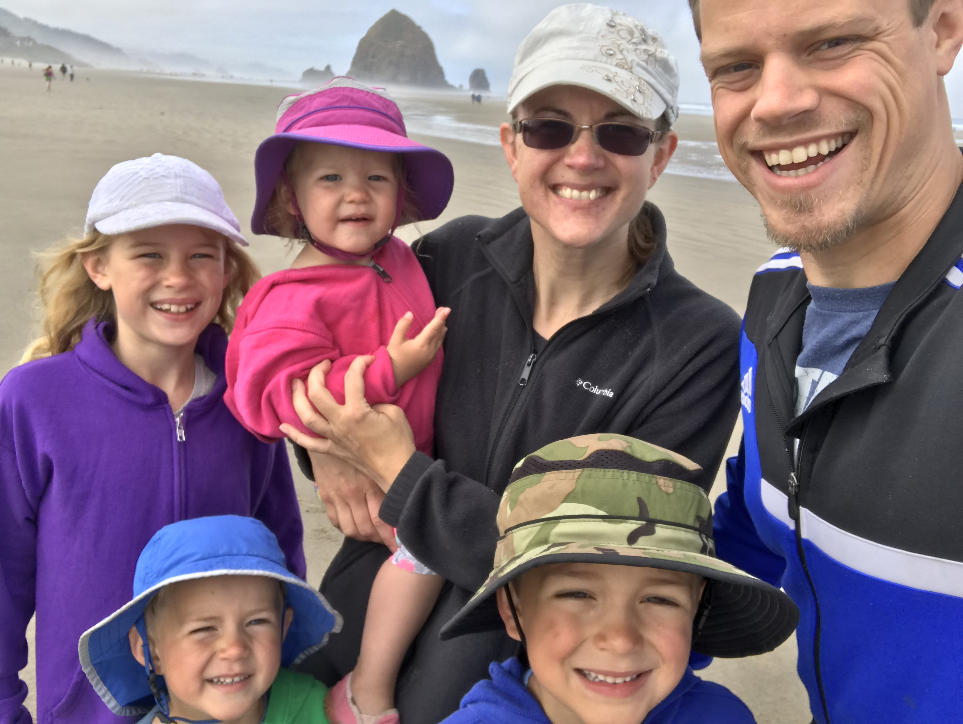 Elayne, Joel, Lily, Amy, Titus and Jordan with Haystack Rock in the background of Cannon Beach!