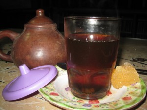 This picture--although not my own--captures the usual elements, glass, lid, small plate and sugar!