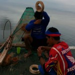 Tagbanwa men preparing to fish without nets.