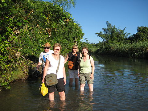 Crossing the river to the tribal village.