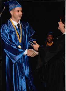Nathan Receiving diploma