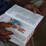An Agutaynen reading the New Testament in their own language.