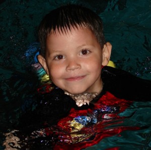 Jonathan taking swimming lessons.                    