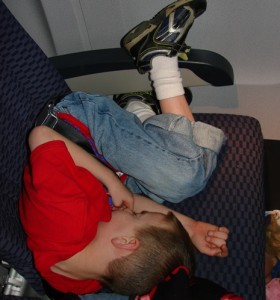 Luke asleep on the plane