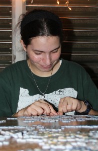 Rebekah working on a puzzle