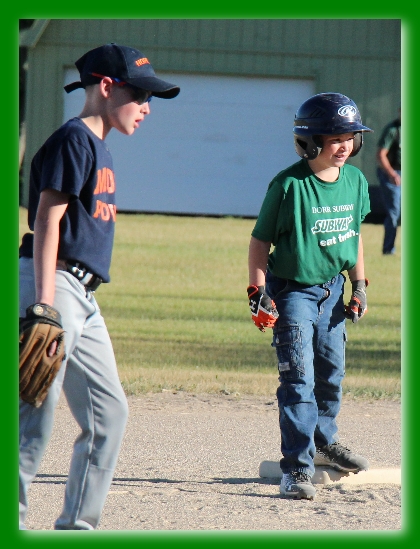 Jonathan, in green, on second base
