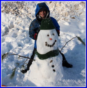 Luke with his snowman