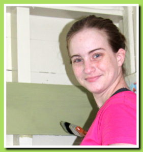 Abigail painting her room.