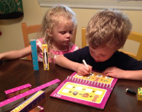 Asa and Naomie doing preschool math