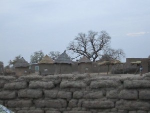 A view of the village over the courtyard wall.