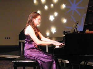 Ashley playing piano