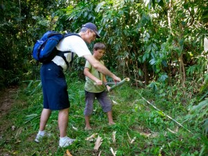 Walter helping a student with bamboo